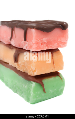 Three fudge bars in three color and flavors like mint, orange and strawberry on a white background Stock Photo