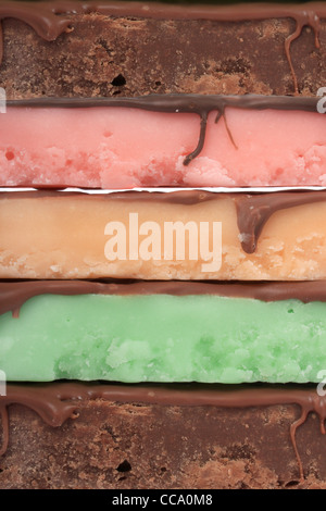 Close up of fudge bar pile in different colors and flavors covered in chocolate Stock Photo