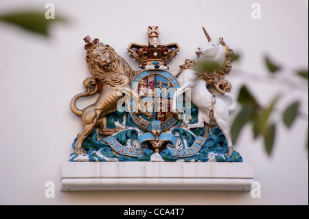 Royal coat of arms of Queen Anne, Grey Coat Hospital, Grey Coat Place, Horseferry Road, Westminster, London England Stock Photo