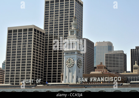 Ferry Building, San Francisco, viewed from the Bay with the Port of San Francisco sign and the high rise Finance District beyond Stock Photo