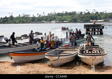 small boats ferries passengers between Buka Island (front) and Bougainville island (background), Papua New Guinea Stock Photo