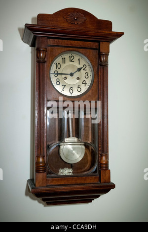 Antique Edwardian wall clock. Stock Photo