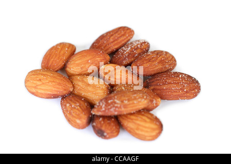 Salted whole almonds on a white background Stock Photo