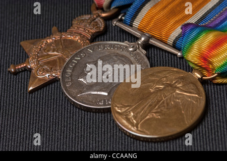 Close up of Pip, Squeak and Wilfred, three British World War 1 campaign medals, 1914 - 1915 Star, British War Medal, Victory Medal Stock Photo