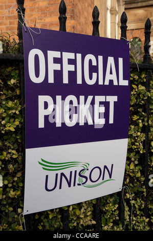 Close up of Unison trade union unions strike striking official picket banner tied to railings York North Yorkshire England UK United Kingdom Britain Stock Photo