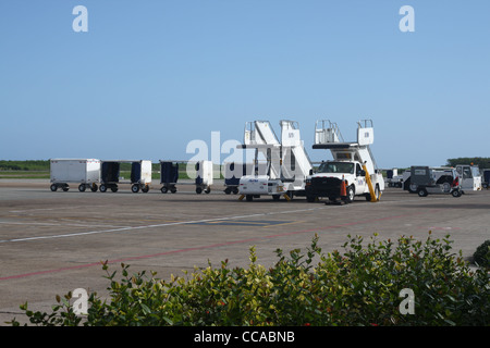 Airport vehicles on the runway in Dominican Republic Stock Photo