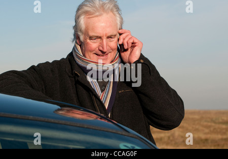 senior male talking on mobile phone Stock Photo