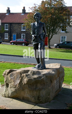 Statue of the young James Cook in Great Ayton, North Yorkshire, Britain. James was a pupil in the village school. Stock Photo