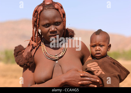 Portrait of Himba mother and child .Kaokoland, Northern Namibia. Stock Photo