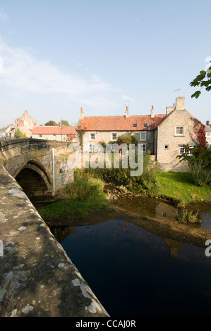 The River Rye and main road bridge in the market town of Helmsley in North Yorkshire,Britain Stock Photo