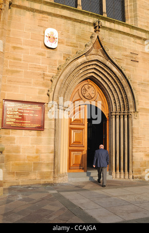 Man entering the Roman Catholic Archdiocese of Glasgow Stock Photo