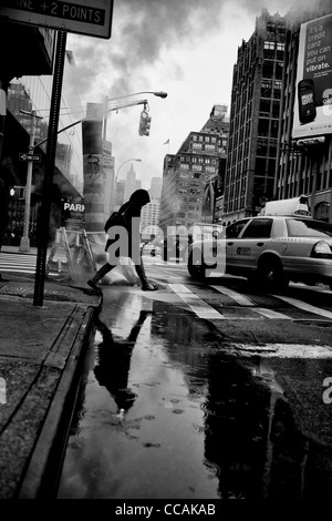 People seen walking on there way to work on 7th Avenue in New York City, USA. Stock Photo