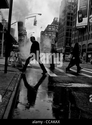 People seen walking on there way to work on 7th Avenue in New York City, USA. Stock Photo