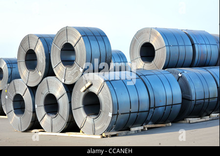 rolls of steel sheet in harbor Stock Photo