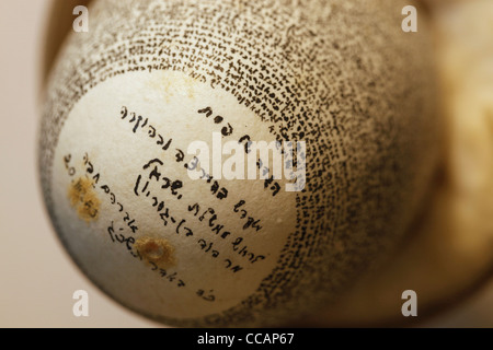 The Haggadah of Pesach religious Jewish text for Passover feast written in Hebrew on an egg displayed in Ben Gurion house museum in Tel Aviv Israel Stock Photo