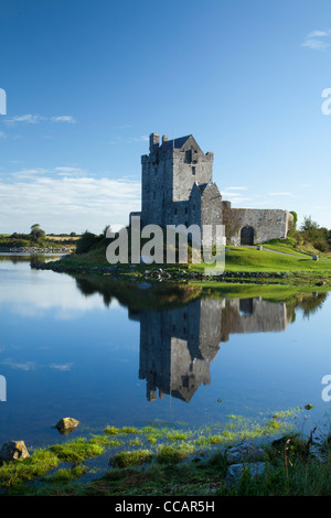 16th-century Dunguaire Castle reflected in Kinvara Bay, Kinvara, County Galway, Ireland. Stock Photo