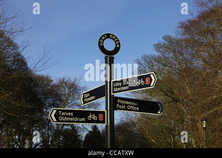 Road sign at the centre of the small village of Udny Green in Aberdeenshire, Scotland, UK Stock Photo