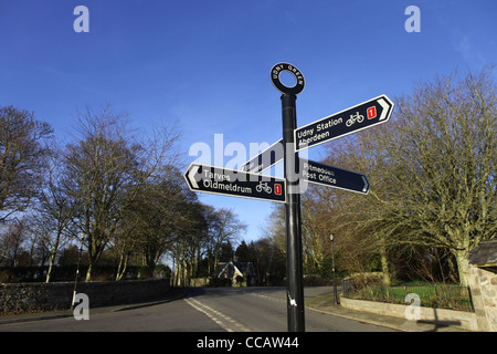 Road sign at the centre of the small village of Udny Green in Aberdeenshire, Scotland, UK Stock Photo