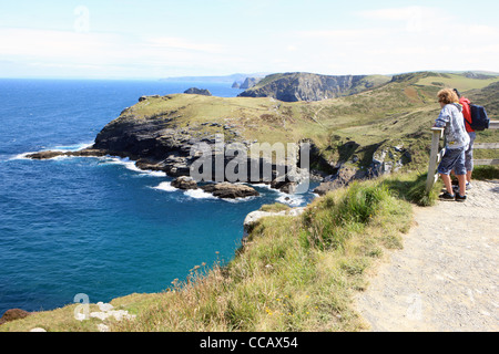 Visitors on the North Cornish coast at Tintagel Castle on a summers day Stock Photo