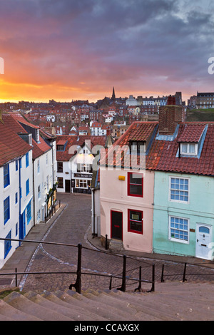 Sunset at the 199 steps Whitby North Yorkshire The Steep 199 step to Whitby town at sunset from Whitby Abbey Steps Whitby North Yorkshire UK GB Europe Stock Photo