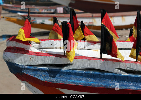 boats on beach at taji fishing village Gambia Stock Photo