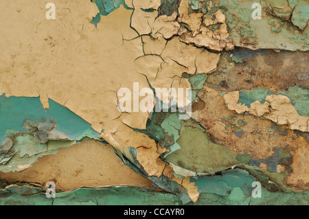 Background of neglected wall with layers of old paint Stock Photo