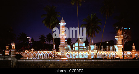 Night at the Jamek Mosque in Kuala Lumpur in Malaysia in Far East Southeast Asia.Islamic Muslim Islam Building Architecture Masjid Religion Religious Stock Photo