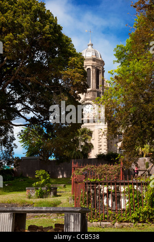 Saint Johns Cathedral rises above the ancient cemetery in St. Johns, Antigua, West Indies Stock Photo