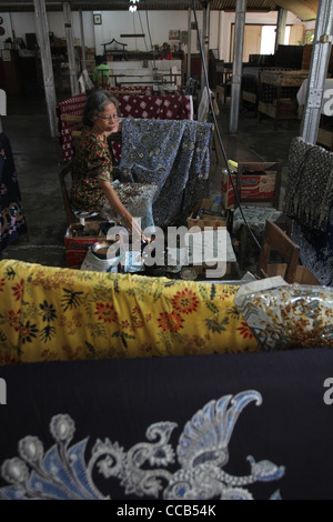 batik fabric production woman working Yogyakarta Indonesia Stock Photo