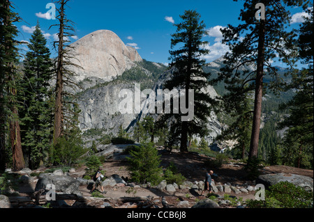 Hiking The Panoramic Trail. Back of Half Dome, Liberty Cap, Nevada Falls. Yosemite National Park. California. USA Stock Photo