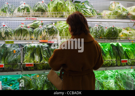 Paris, France, Woman Shopping Alone in Chinatown, Asian Food Store, Fresh Vegetables, supermarket plastic packaging