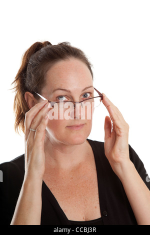 Woman Adjusting Spectacles Stock Photo