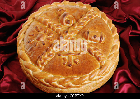 Serbian Orthodox Traditional Christmas Bread Known as a Cesnica. Stock Photo