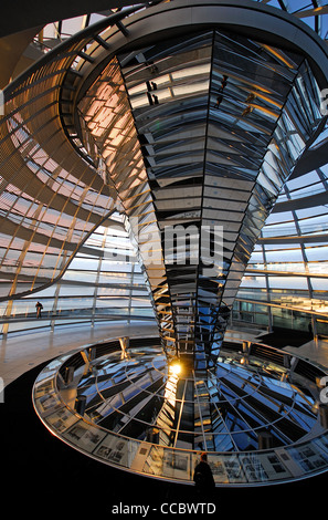 BERLIN, GERMANY. A winter sunrise reflected in mirrored panels inside the dome of the Reichstag. 2012. Stock Photo