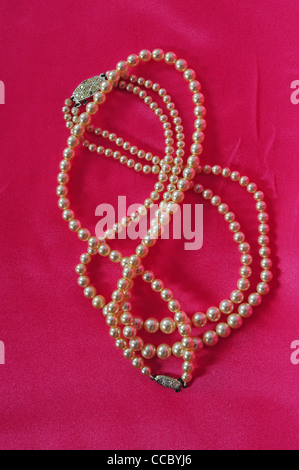 Two artificial pearl necklaces Stock Photo