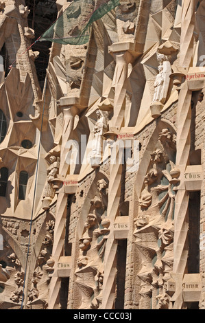 EUROPE SPAIN Barcelona Gaudi’s incomplete Catholic Church Temple Expiatori de la Sagrada Familia Passion façade detail showing m Stock Photo
