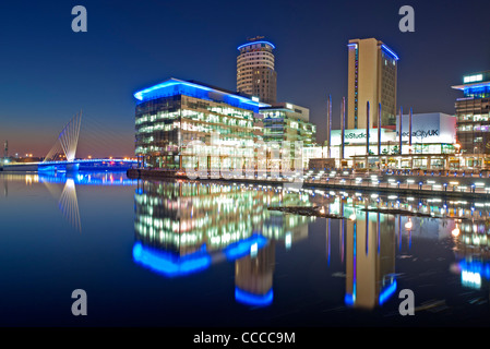 Media City Footbridge and Studios at MediaCityUK at Night, Salford Quays, Greater Manchester, England, UK Stock Photo