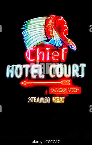A Native American warrior neon sign decorates Fremont Street in Las Vegas, NV, one of the city's classic neon signs. Stock Photo