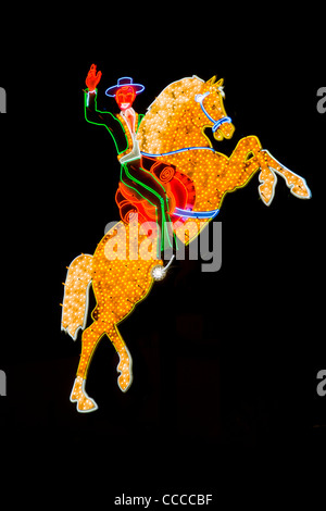 A horse-mounted gaucho neon sign decorates Fremont Street in Las Vegas, NV, as part of the 'Fremont Street Experience'. Stock Photo