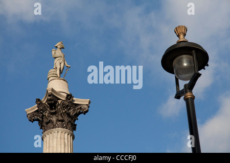 Nelson's column in Trafalgar Square with a lamp post in the foreground Stock Photo