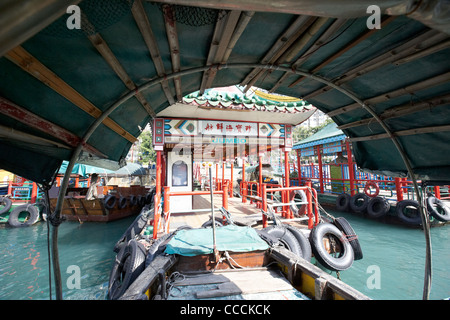 interior of a tourist cruise sampan and jetty in aberdeen harbour hong kong hksar china asia Stock Photo