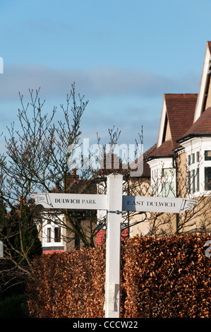 A sign post in front of suburban houses in Dulwich, South London. Stock Photo