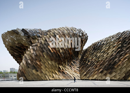 Spain''S Pavilion Is Made Of Wicker On The Exterior. It Features A Giant Animated Baby Installation.It Is Built By Miralles Stock Photo