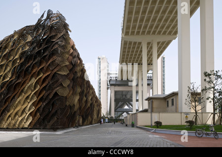 Spain''S Pavilion Is Made Of Wicker On The Exterior. It Features A Giant Animated Baby Installation.It Is Built By Miralles Stock Photo