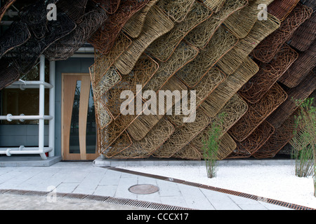 Spain''S Pavilion Is Made Of Wicker On The Exterior. It Features A Giant Animated Baby Installation.It Is Built By Miralles Stock Photo