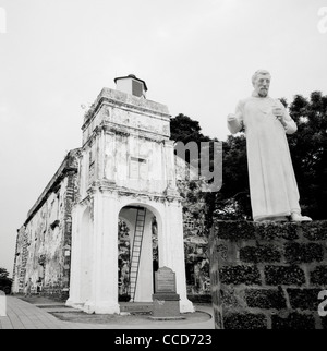 Statue of the Jesuit Christian St Francis Xavier outside the ruins of Saint Paul's Church in Malacca Melaka in Malaysia in Far East Southeast Asia. Stock Photo