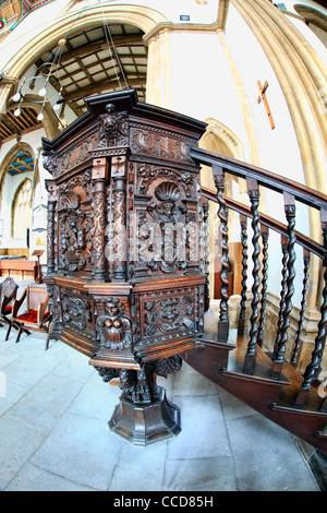 Beautifully carved Jacobean pulpit, St Cuthbert's Parish Church, Wells, Somerset, England. Stock Photo