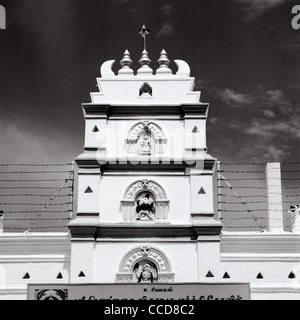 Gopuram entrance tower of the Hindu Sri Poyyatha Vinayagar Moorthi Temple building in Malacca Melaka in Malaysia in Far East Southeast Asia. Travel Stock Photo