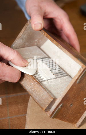 Traditional tailoring chalk and sharpening box on Savile Row, London, United Kingdom. Photo: Jeff Gilbert Stock Photo