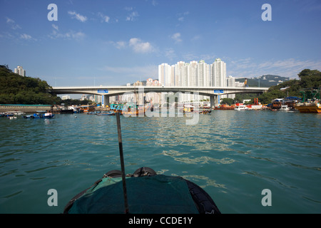 view from a sampan of aberdeen harbour and ap lei chau bridge hong kong hksar china asia Stock Photo